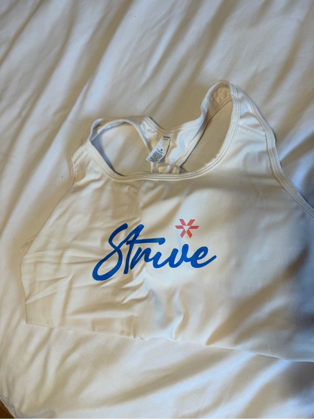 Strive White Sports Bra with Blue Logo